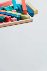 Close-up of multi colored toy blocks on white background