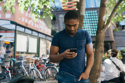 Young man using mobile phone