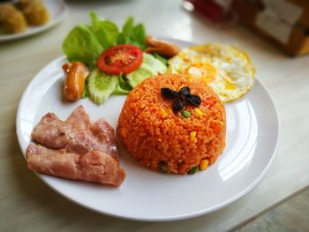 Close-up of breakfast served on table