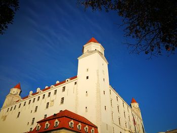 Low angle view of clock tower against sky