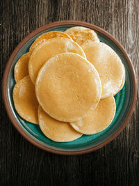 Directly above shot of pancakes in plate on table