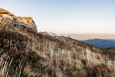 Scenic view of rocky mountains against clear sky