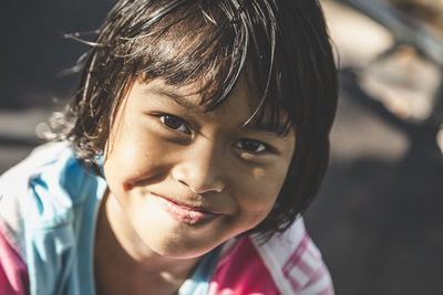 Close-up portrait of smiling boy