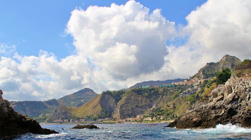 Panoramic view of sea and mountains against sky, sicily, ionian sea