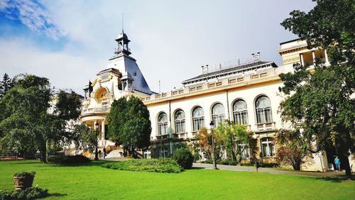 View of temple against building