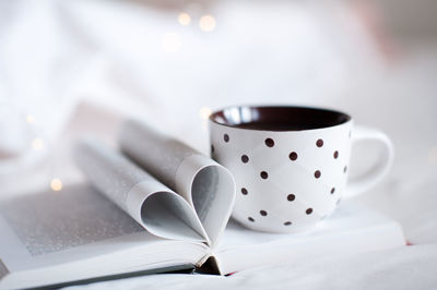 Close-up of coffee cup on table