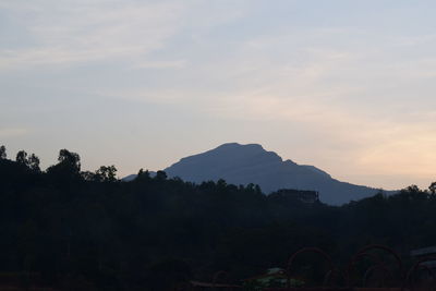 Scenic view of mountains against sky during sunset