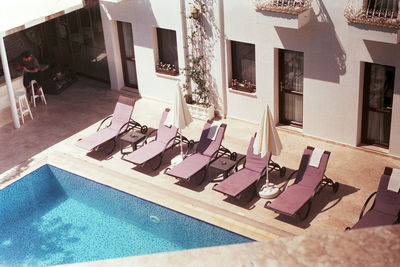 High angle view of swimming pool by building