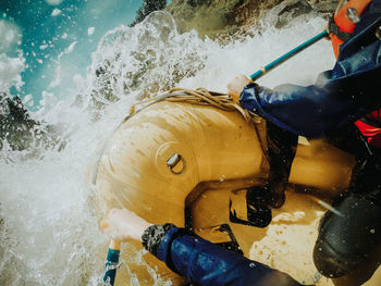 People rafting in river