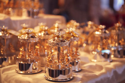 Close-up of wine glasses on table