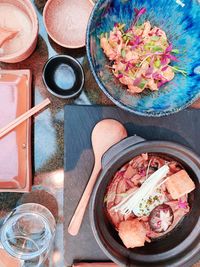 High angle view of various flowers in bowl on table