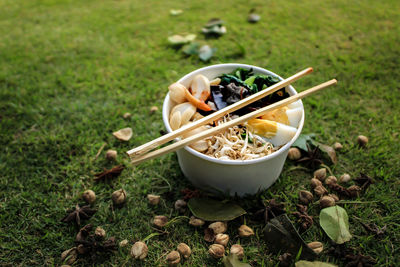 High angle view of food in container on field