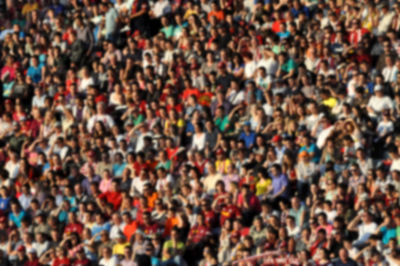 Defocused image of people on soccer field