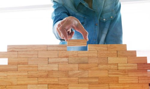 Full length of man working on wood