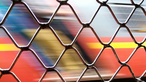 Blurred motion of train seen through window