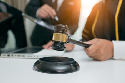 Close-up of person working on table