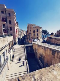 High angle view of canal amidst buildings in city