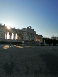 Facade of historic building against clear sky