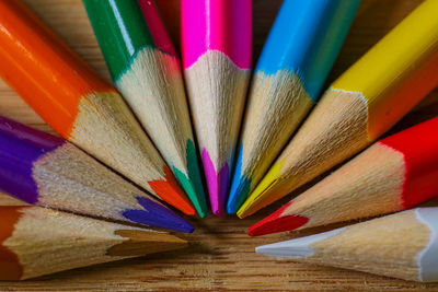 High angle view of multi colored pencils on table