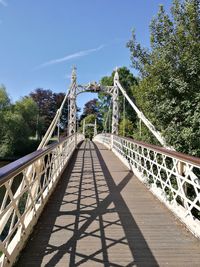 Footbridge against sky