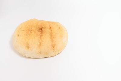 Close-up of cake against white background