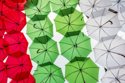 Full frame shot of umbrella hanging against sky