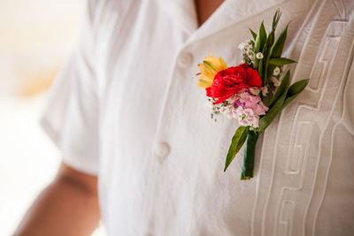 Close-up of woman holding bouquet