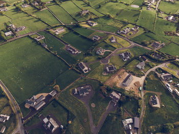 Aerial view of houses on field