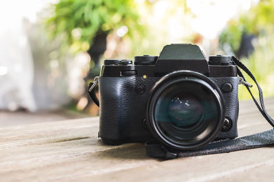 Close-up of camera on table