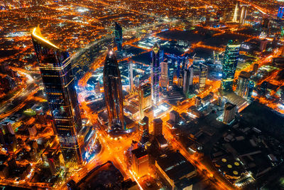 High angle view of illuminated cityscape at night