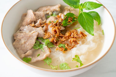 Close-up of food in bowl on white background