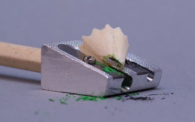 Close-up of sharpener on gray background
