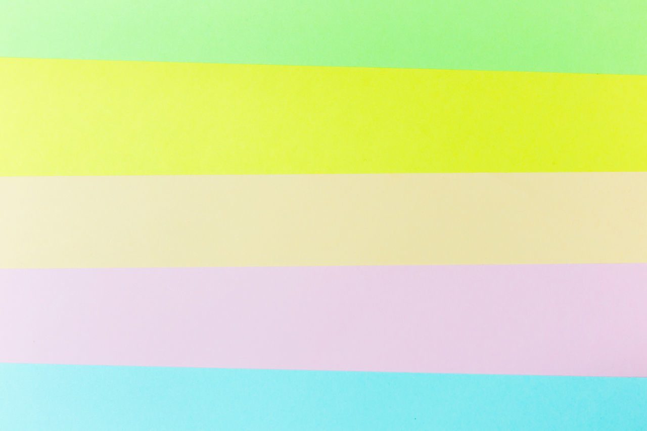 FULL FRAME SHOT OF MULTI COLORED YELLOW PAPER