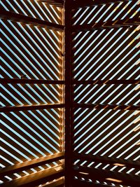 Look into the sky through a wooden rooftop- geometric optical illusion 