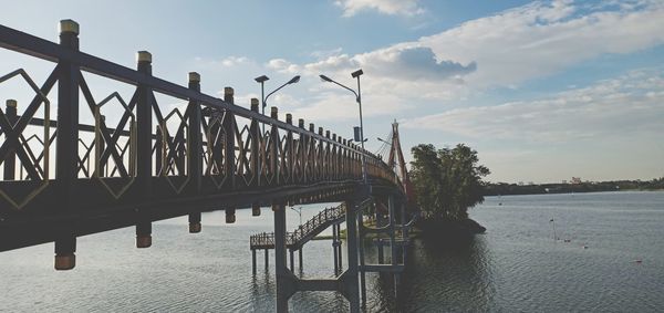 Pier over sea against sky