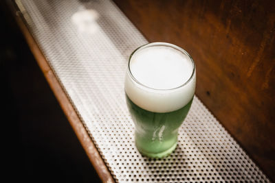 High angle view of beer glass on table