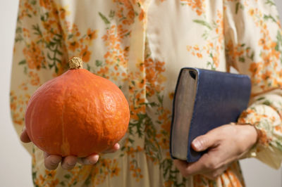 Midsection of man using mobile phone