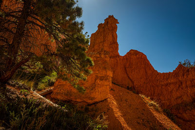 Rock formation on mountain against sky
