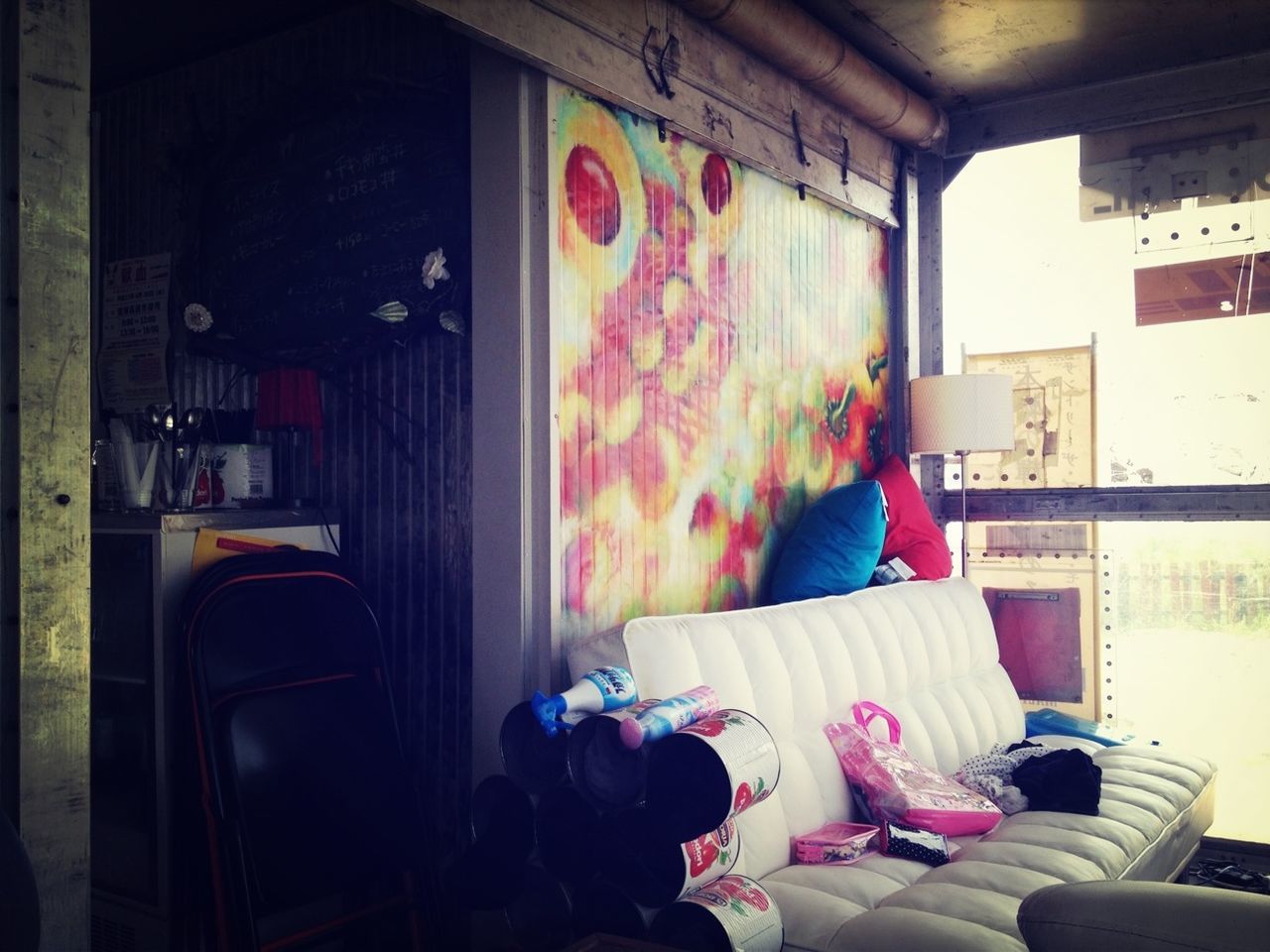 indoors, home interior, curtain, window, absence, multi colored, house, built structure, book, chair, architecture, clothing, bed, bedroom, sofa, open, graffiti, empty, day, domestic room