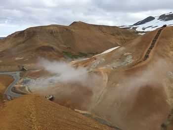 Panoramic view of volcanic landscape against sky