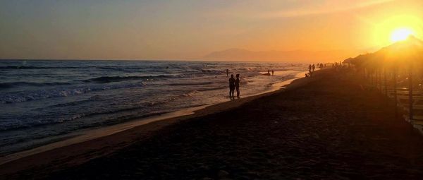 Scenic view of sea at sunset