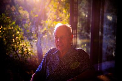 Portrait of man against plants