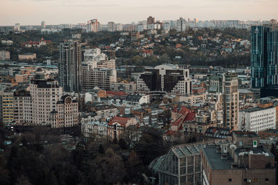 High angle view of buildings in city against sky