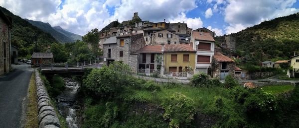 Panoramic view of old buildings against sky