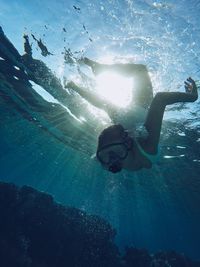 Man swimming in sea