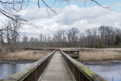 View of bridge over lake against sky