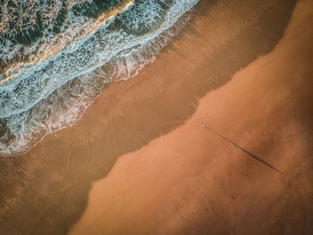 High angle view of sand dunes at beach