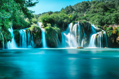 View of waterfall in forest