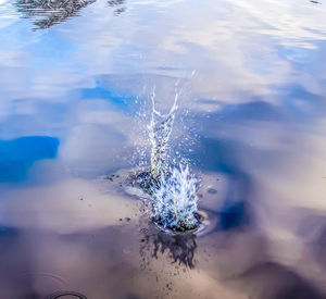 High angle view of water splashing in sea