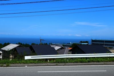 Buildings against blue sky and clouds